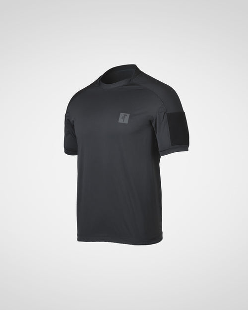 Black athletic shirt with Tomahawk Performance brand logo on a light gray background