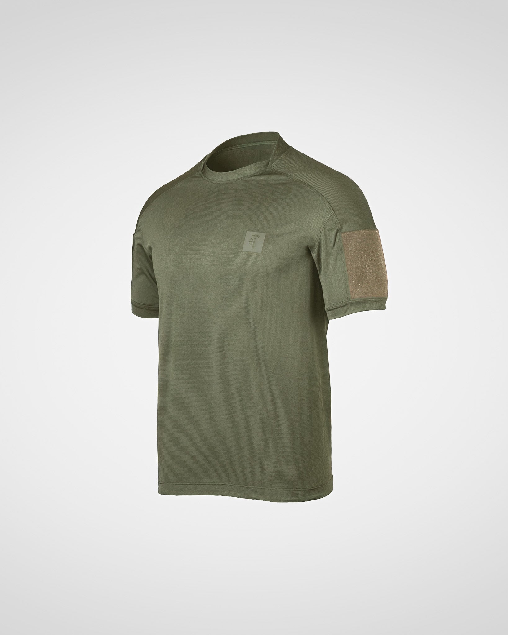 An olive green short-sleeve tactical t-shirt with a tan mesh patch on the right sleeve and a small square logo patch on the left chest, shown on a light gray background.