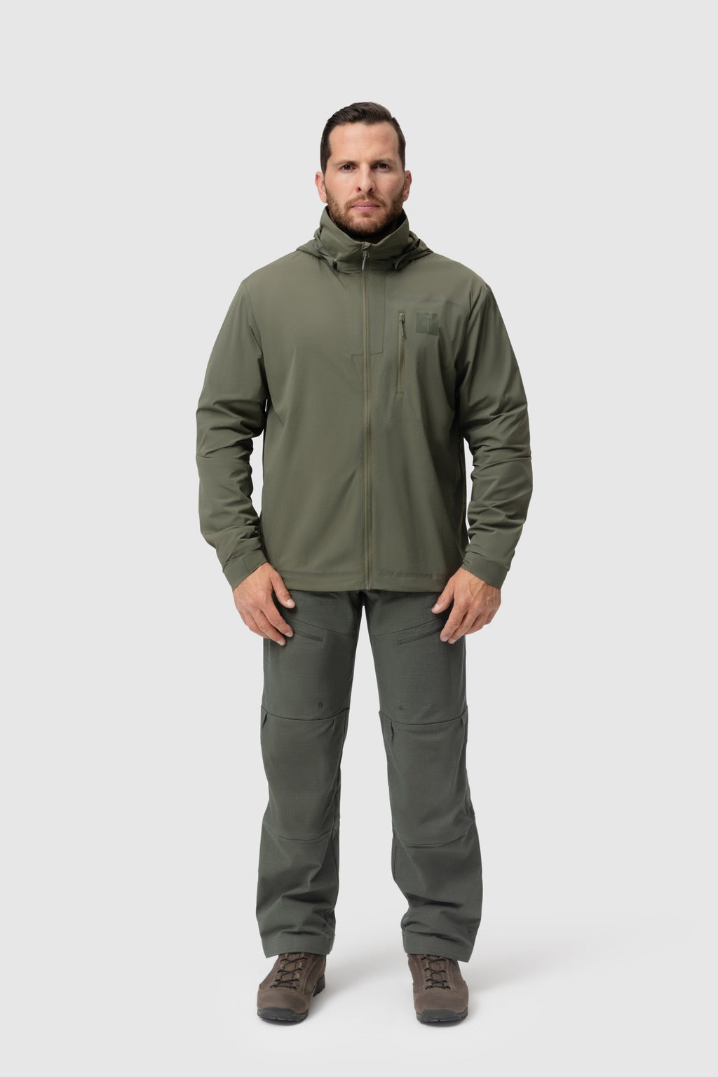 Frontal photo of the Tomahawk Performance Overlayer Anorak, a tactical urban or military use wind jacket/windbreaker layer, in the Ranger Green color way.