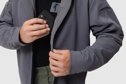 Close-up photo of the Tomahawk Performance Instructor Jacket's interior lining zippered stash pocket.