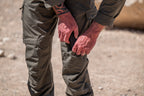 Close-up photo showing the perforated kneepad being inserted into the adjustable pouch on the Tomahawk Performance HW / Combat Pant.