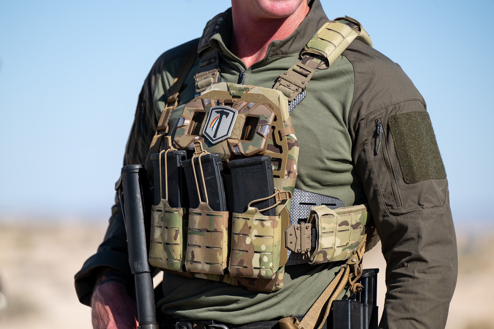 In situ photo of the Tomahawk Performance HW / Combat Shirt worn under a plate carrier.